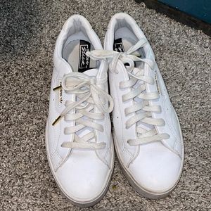 Women’s white adidas size 7.5.